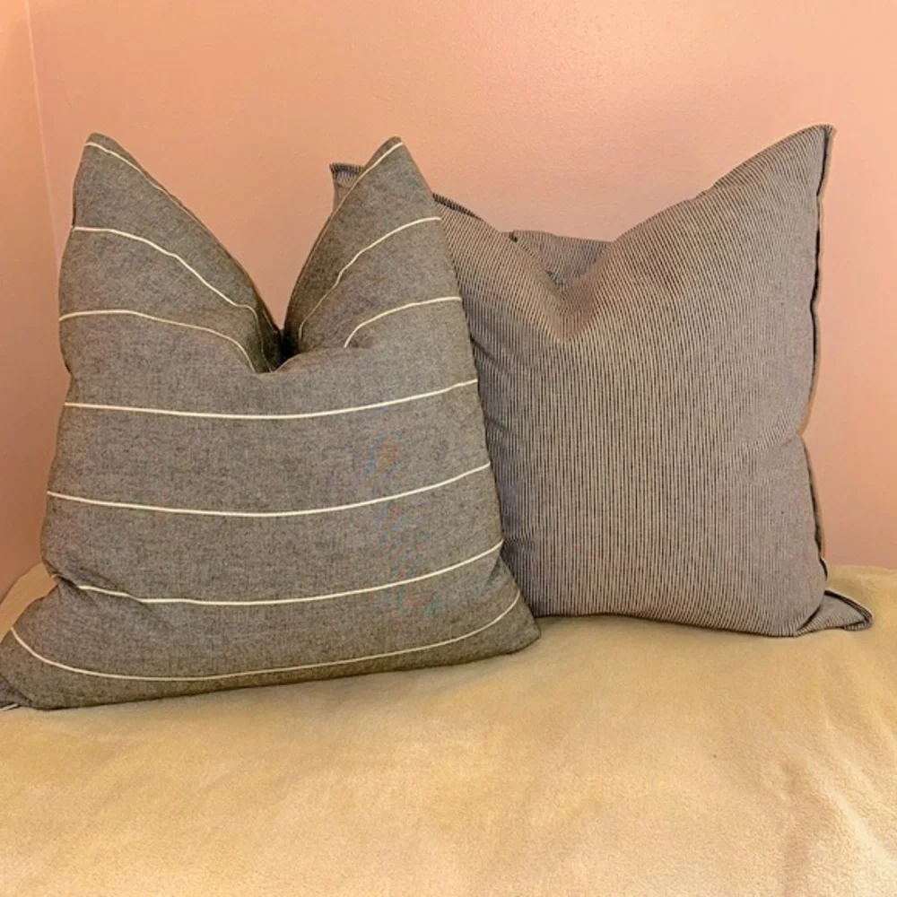 Two IKEA Mildrun pillow covers